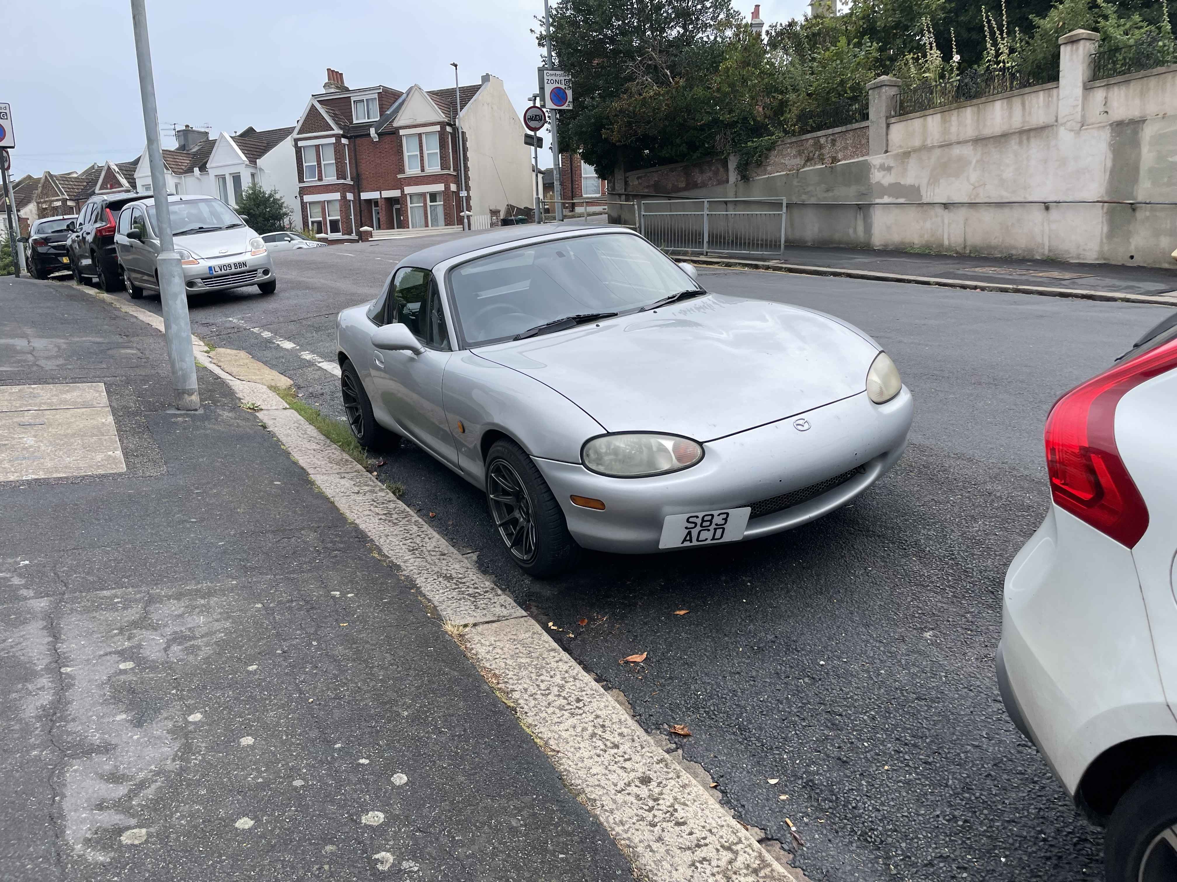Photograph of S83 ACD - a Silver Mazda MX-5 parked in Hollingdean by a non-resident. The first of two photographs supplied by the residents of Hollingdean.