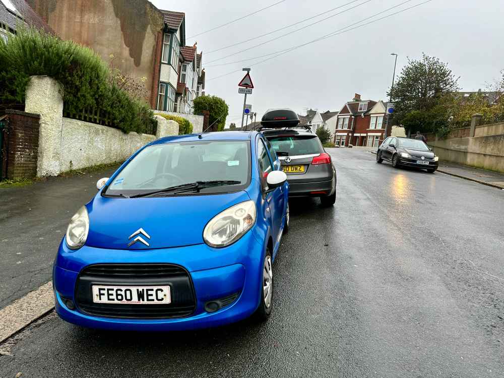 Photograph of FE60 WEC - a Blue Citroen C1 parked in Hollingdean by a non-resident. The seventh of thirteen photographs supplied by the residents of Hollingdean.