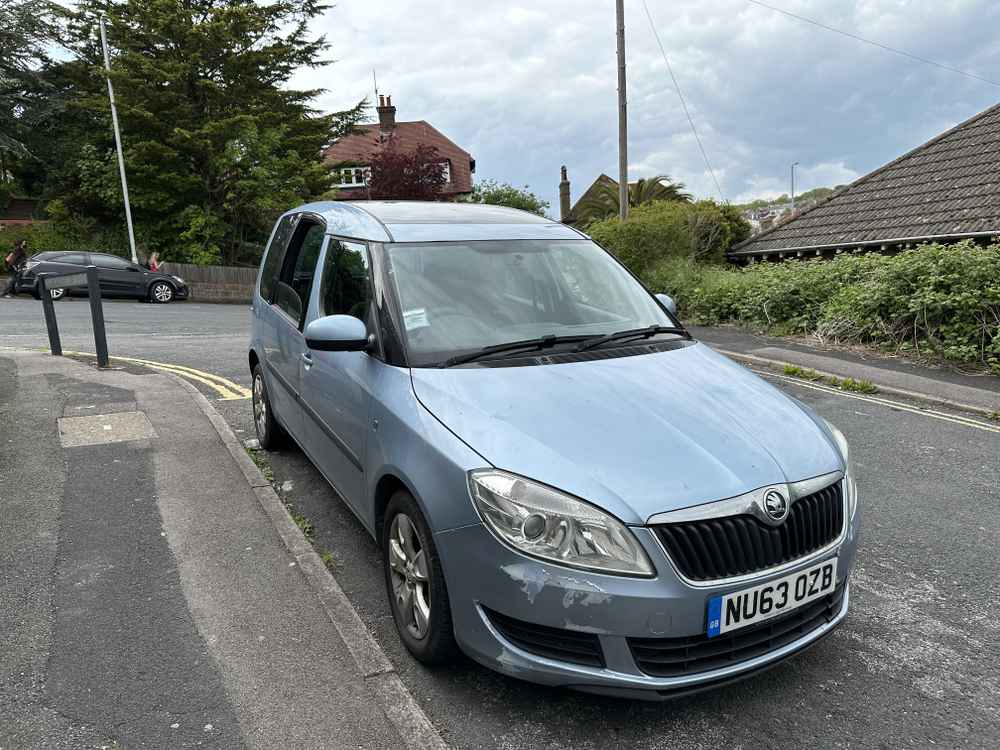 Photograph of NU63 OZB - a Blue Skoda Roomster parked in Hollingdean by a non-resident. The second of twenty-three photographs supplied by the residents of Hollingdean.