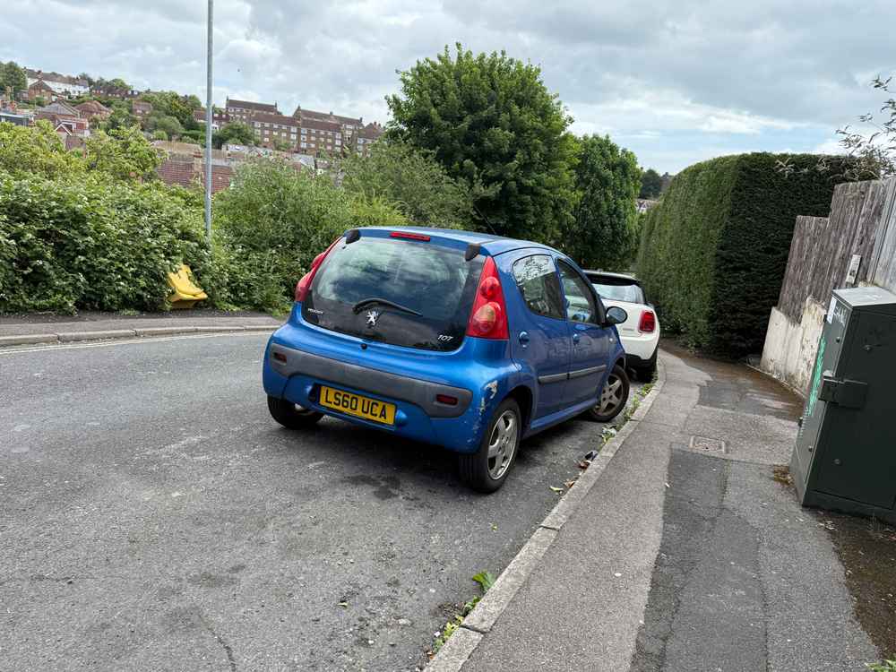 Photograph of LS60 UCA - a Blue Peugeot 107 parked in Hollingdean by a non-resident. The twenty-first of twenty-one photographs supplied by the residents of Hollingdean.