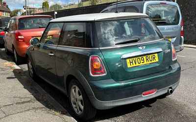 HV09 RUR, a Green Mini Cooper parked in Hollingdean
