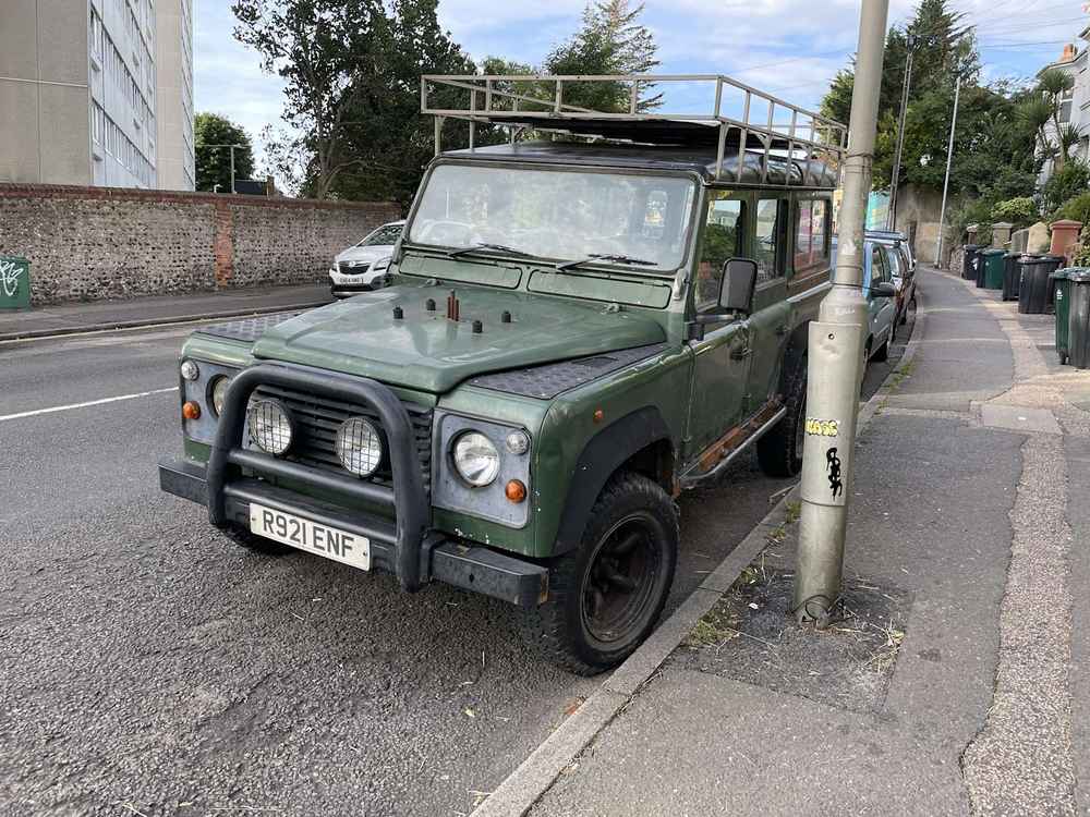 Photograph of R921 ENF - a Green Land Rover Defender parked in Hollingdean by a non-resident. The first of twelve photographs supplied by the residents of Hollingdean.