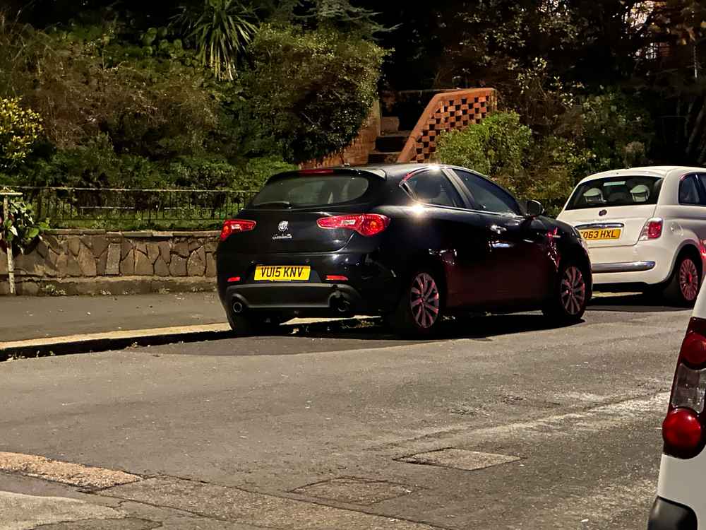 Photograph of VU15 KNV - a Black Alfa Romeo Giulietta parked in Hollingdean by a non-resident. The sixth of fifteen photographs supplied by the residents of Hollingdean.