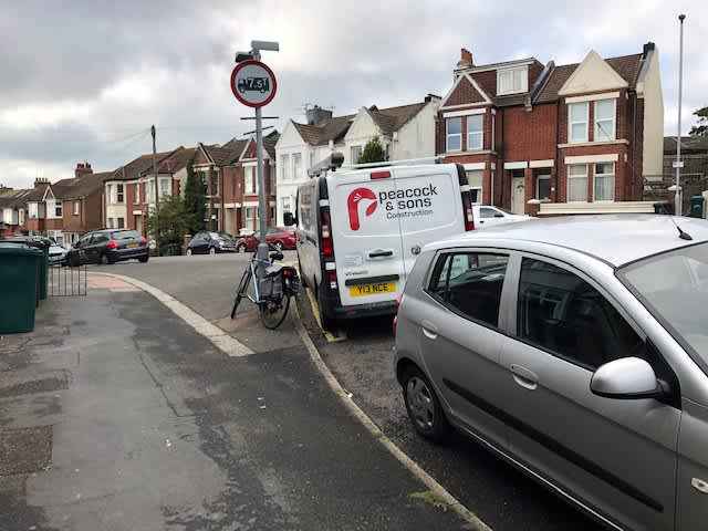 Photograph of Y13 NCE - a white Vauxhall Vivaro parked in Hollingdean by a non-resident. The third of four photographs supplied by the residents of Hollingdean.