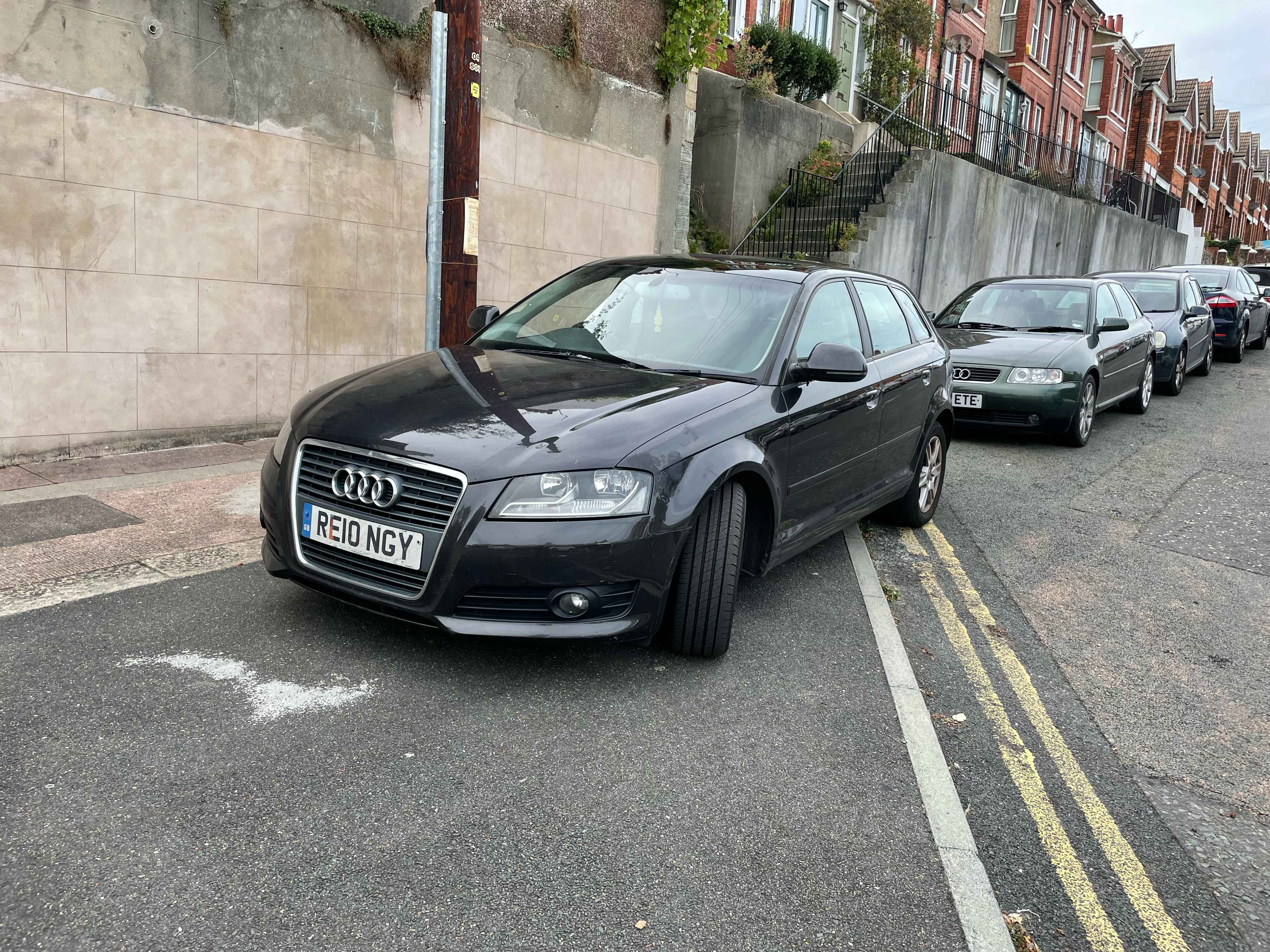 Photograph of RE10 NGY - a Black Audi A3 parked in Hollingdean by a non-resident who uses the local area as part of their Brighton commute. The second of three photographs supplied by the residents of Hollingdean.