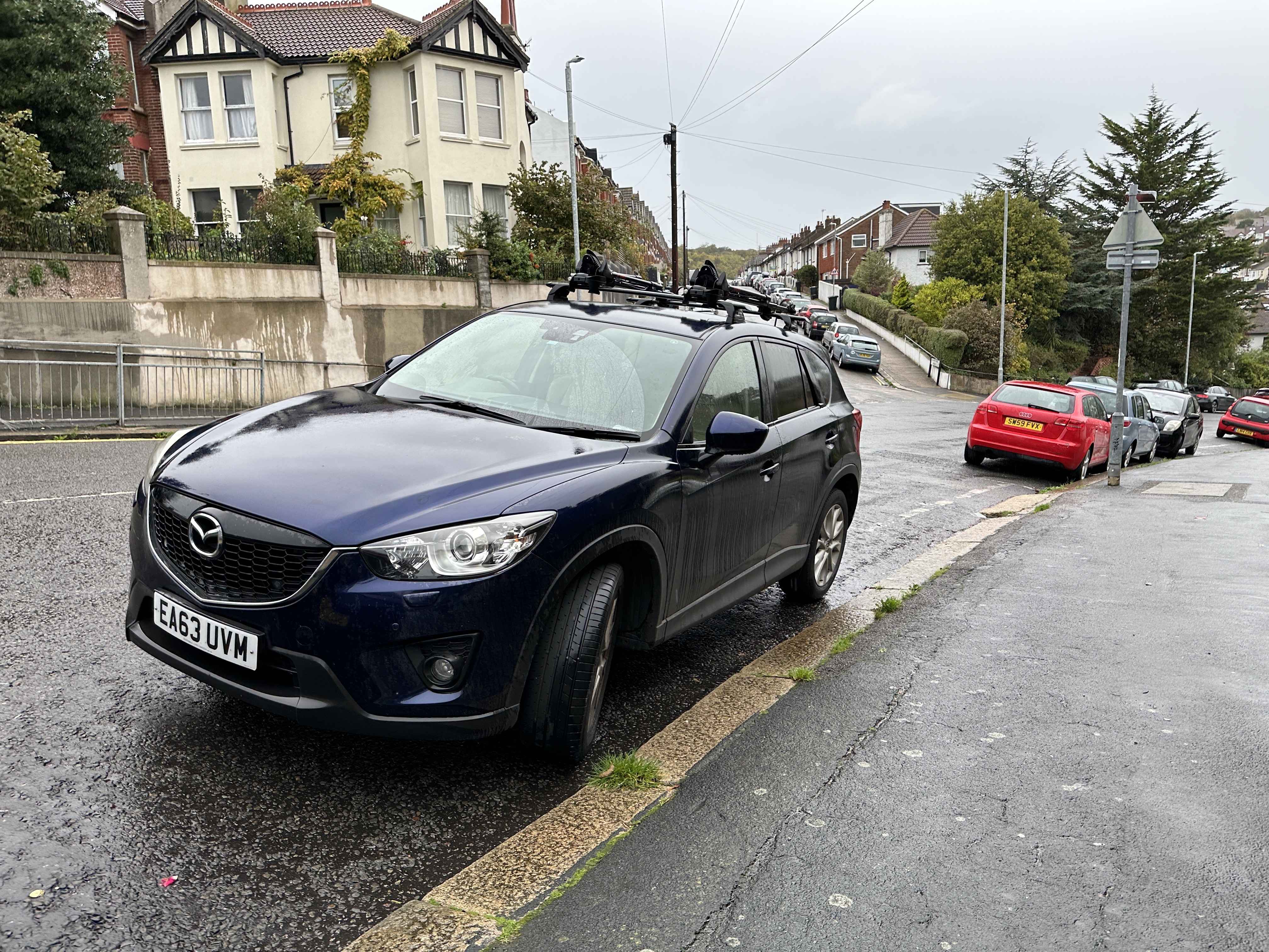 Photograph of EA63 UVM - a Blue Mazda CX-5 parked in Hollingdean by a non-resident. The first of two photographs supplied by the residents of Hollingdean.