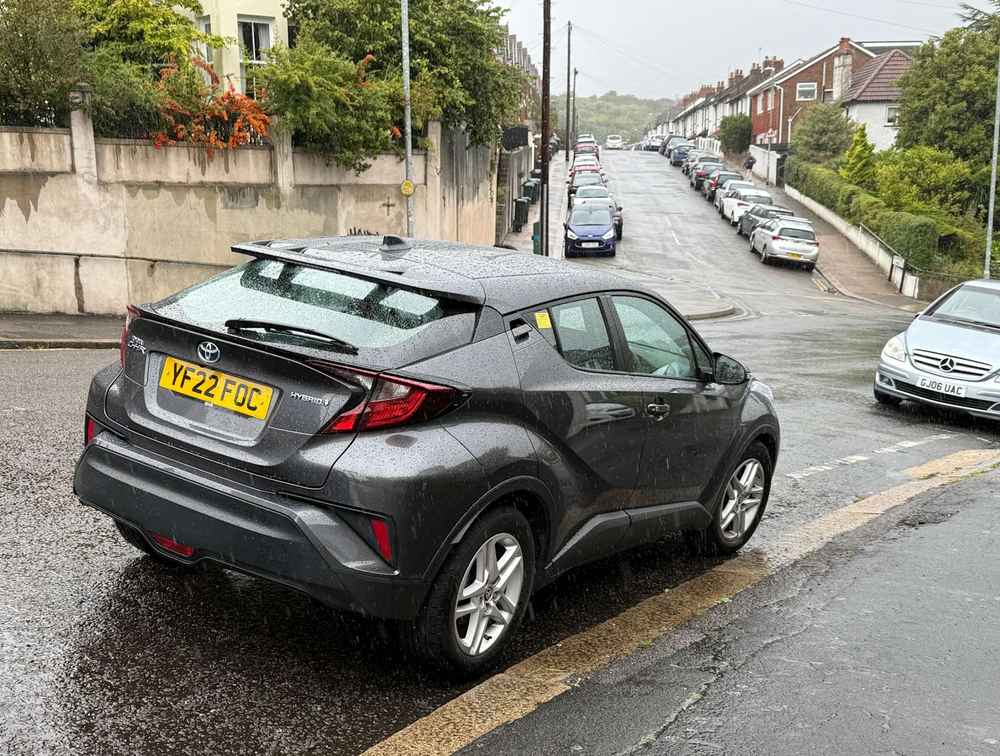 Photograph of YF22 FOC - a Grey Toyota C-HR taxi parked in Hollingdean by a non-resident. The fourth of nine photographs supplied by the residents of Hollingdean.