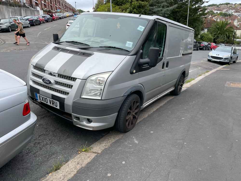 Photograph of EX10 VRU - a Silver Ford Transit parked in Hollingdean by a non-resident. The first of sixteen photographs supplied by the residents of Hollingdean.