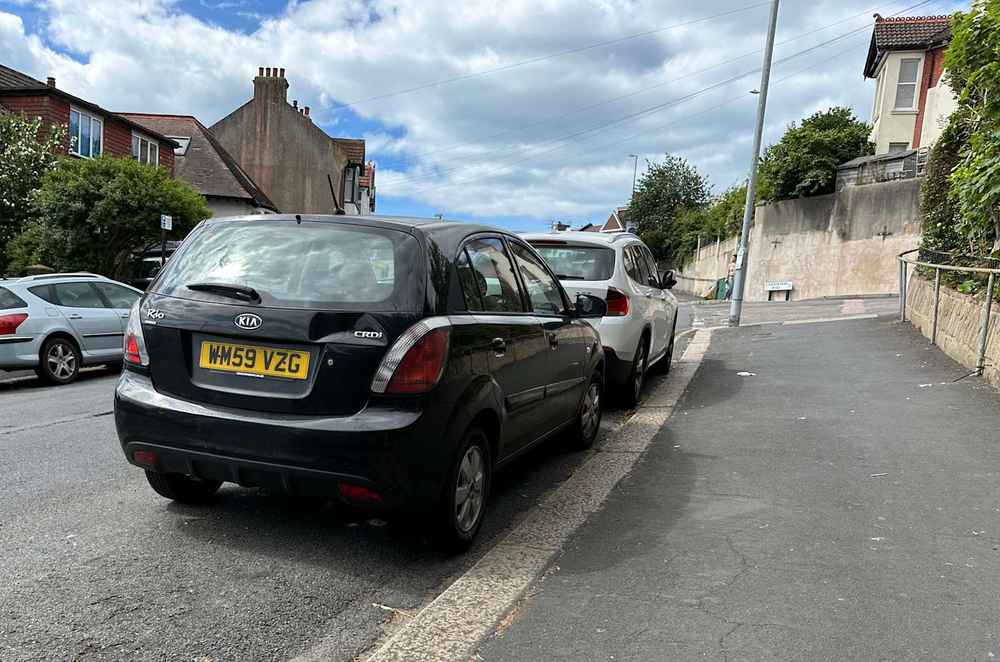 Photograph of WM59 VZG - a Black Kia Rio parked in Hollingdean by a non-resident. The eighth of nine photographs supplied by the residents of Hollingdean.