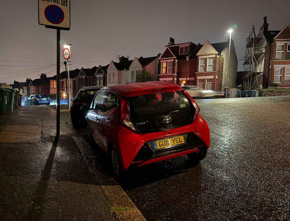 Photograph of GU18 YEL - a Red Toyota Aygo parked in Hollingdean by a non-resident. The eleventh of eleven photographs supplied by the residents of Hollingdean.