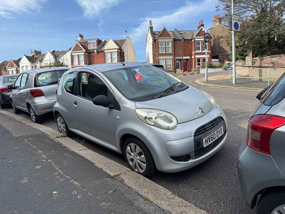Photograph of HV60 DYO - a Silver Citroen C1 parked in Hollingdean by a non-resident. The first of two photographs supplied by the residents of Hollingdean.