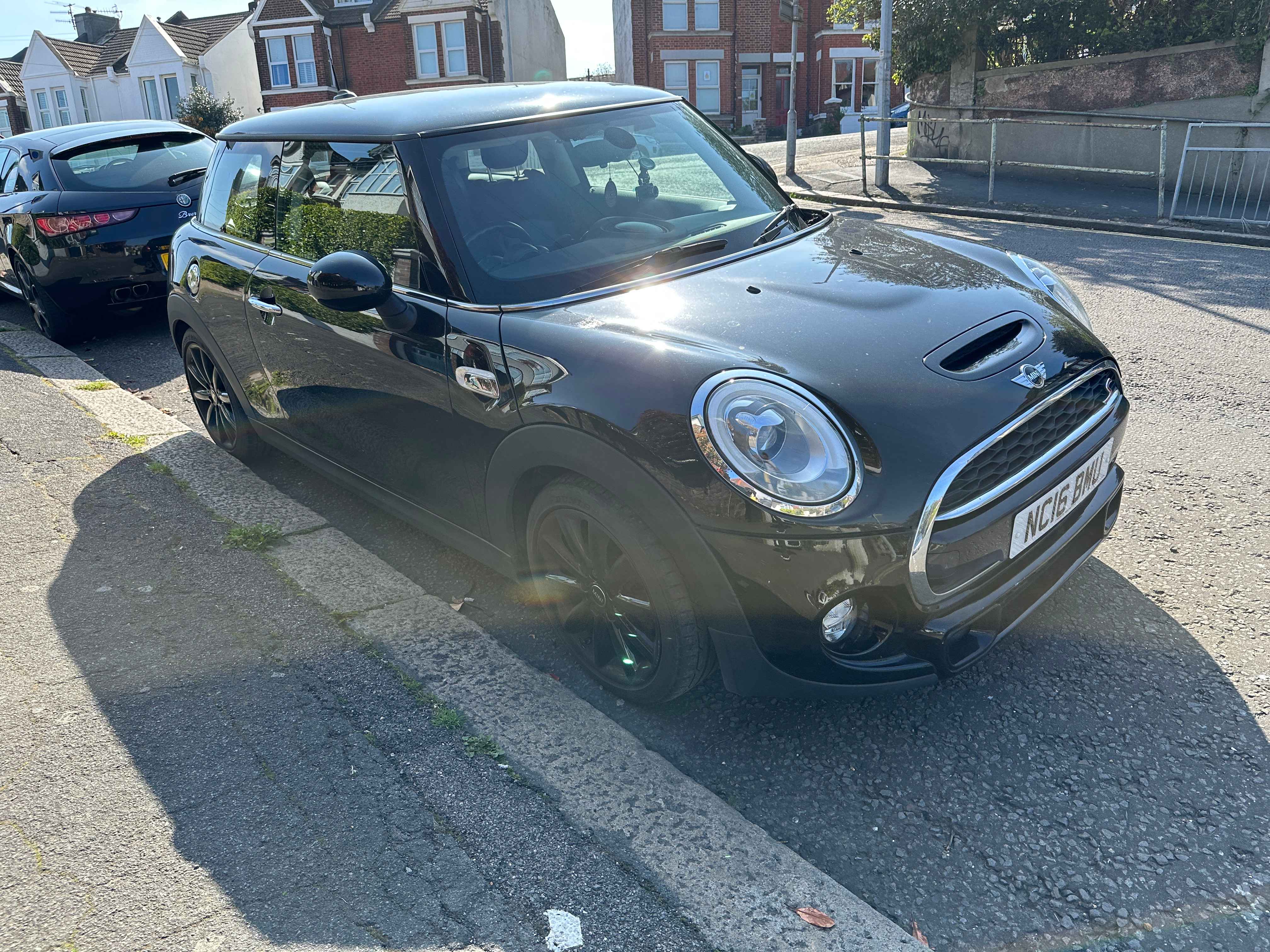 Photograph of NC16 BMU - a Black Mini Cooper parked in Hollingdean by a non-resident who uses the local area as part of their Brighton commute. The first of four photographs supplied by the residents of Hollingdean.