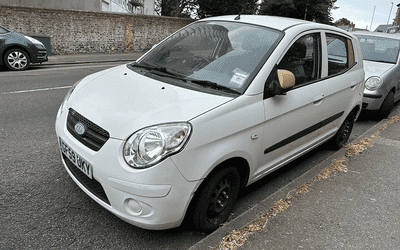 GF59 UKY, a White Kia Picanto parked in Hollingdean