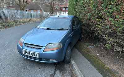 BP06 GWA, a Blue Chevrolet Kalos parked in Hollingdean