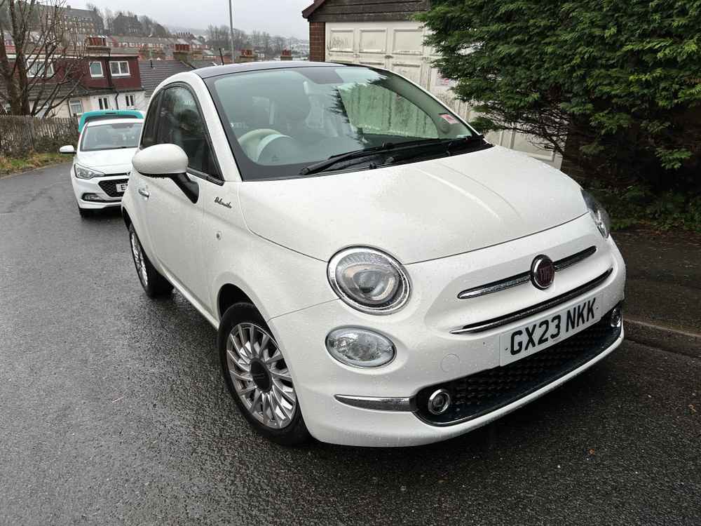 Photograph of GX23 NKK - a White Fiat 500 parked in Hollingdean by a non-resident who uses the local area as part of their Brighton commute. The third of three photographs supplied by the residents of Hollingdean.