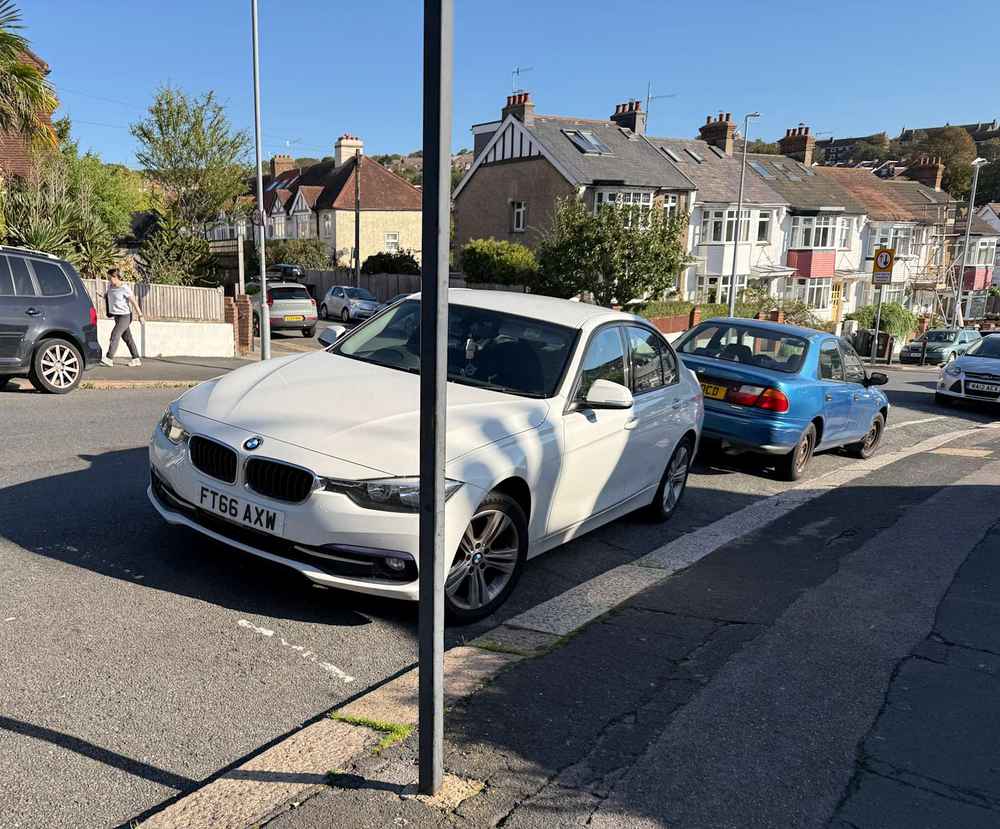 Photograph of FT66 AXW - a White BMW 3 Series parked in Hollingdean by a non-resident who uses the local area as part of their Brighton commute. The twentieth of twenty-five photographs supplied by the residents of Hollingdean.