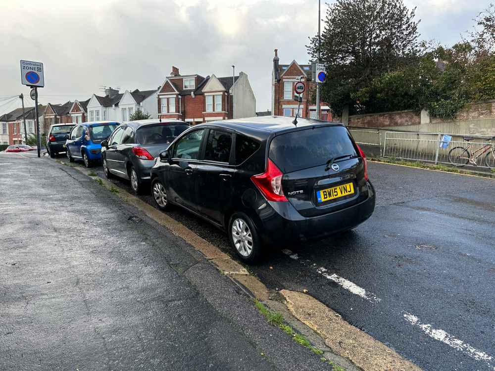 Photograph of BW15 VNJ - a Black Nissan Note parked in Hollingdean by a non-resident who uses the local area as part of their Brighton commute. The eleventh of twenty photographs supplied by the residents of Hollingdean.
