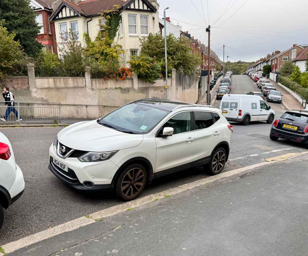 Photograph of WG14 NSF - a White Nissan Qashqai parked in Hollingdean by a non-resident who uses the local area as part of their Brighton commute. The eleventh of twelve photographs supplied by the residents of Hollingdean.