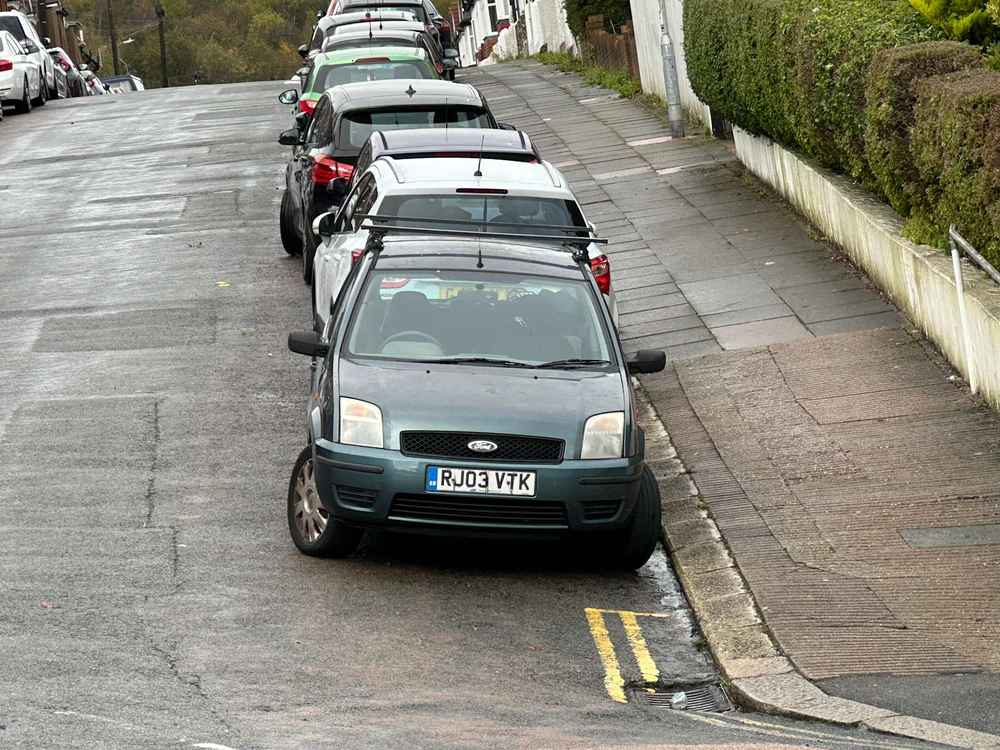 Photograph of RJ03 VTK - a Green Ford Fusion parked in Hollingdean by a non-resident. The fourth of five photographs supplied by the residents of Hollingdean.
