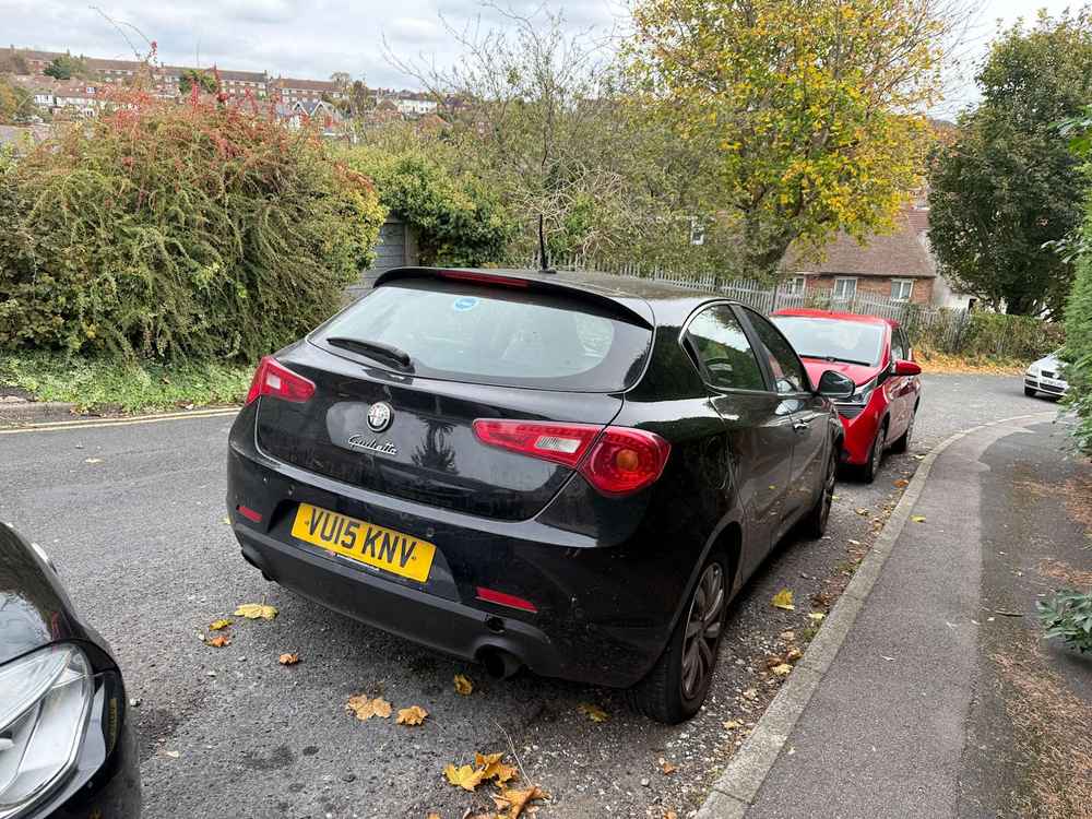 Photograph of VU15 KNV - a Black Alfa Romeo Giulietta parked in Hollingdean by a non-resident. The thirtieth of thirty-four photographs supplied by the residents of Hollingdean.