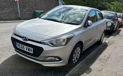 RE66 VWH, a Silver Hyundai i20 parked in Hollingdean