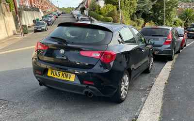 VU15 KNV, a Black Alfa Romeo Giulietta parked in Hollingdean