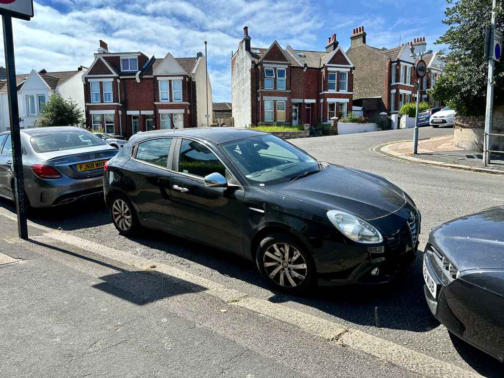 Photograph of VU15 KNV - a Black Alfa Romeo Giulietta parked in Hollingdean by a non-resident. The seventeenth of nineteen photographs supplied by the residents of Hollingdean.