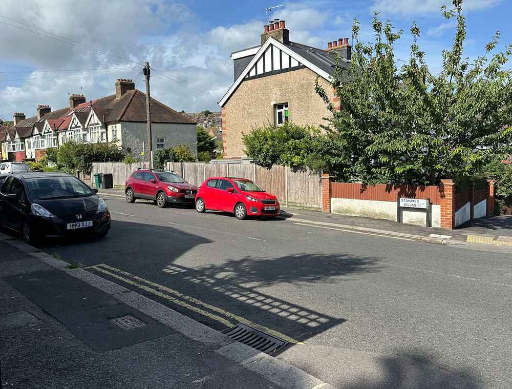 Photograph of MA64 YHZ - a Red Peugeot 108 parked in Hollingdean by a non-resident who uses the local area as part of their Brighton commute. The seventh of fourteen photographs supplied by the residents of Hollingdean.