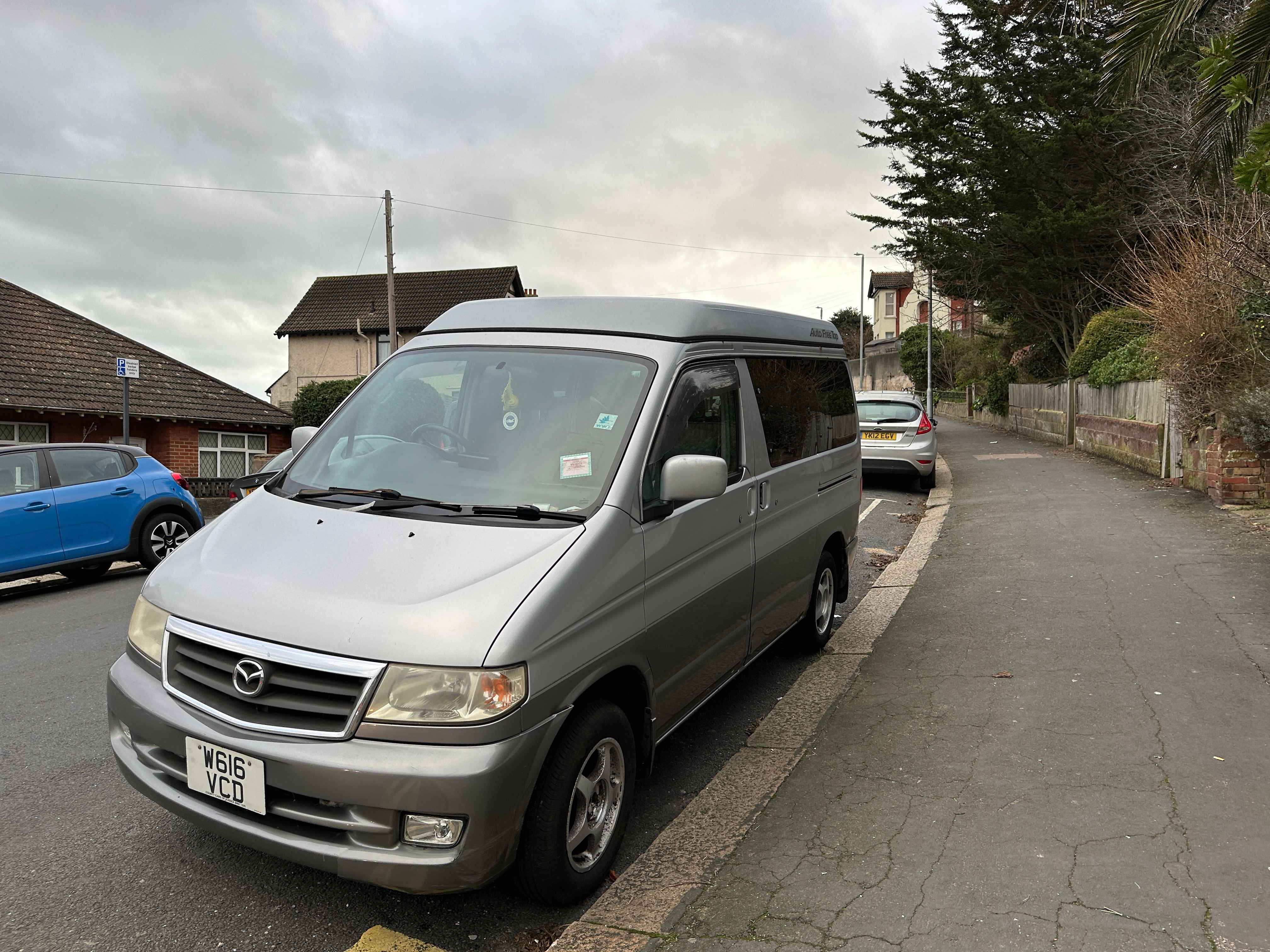 Photograph of W616 VCD - a Silver Mazda Bongo camper van parked in Hollingdean by a non-resident. The second of three photographs supplied by the residents of Hollingdean.
