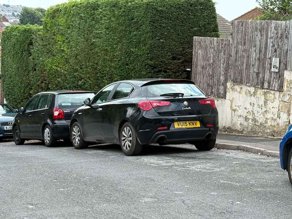 Photograph of VU15 KNV - a Black Alfa Romeo Giulietta parked in Hollingdean by a non-resident. The twenty-eighth of thirty-four photographs supplied by the residents of Hollingdean.