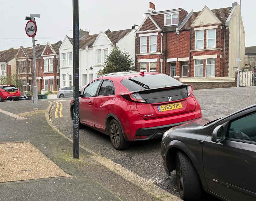 Photograph of AY66 VPL - a Red Honda Civic parked in Hollingdean by a non-resident. The sixth of seven photographs supplied by the residents of Hollingdean.