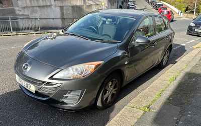 DN11 FWP, a Grey Mazda 3 parked in Hollingdean