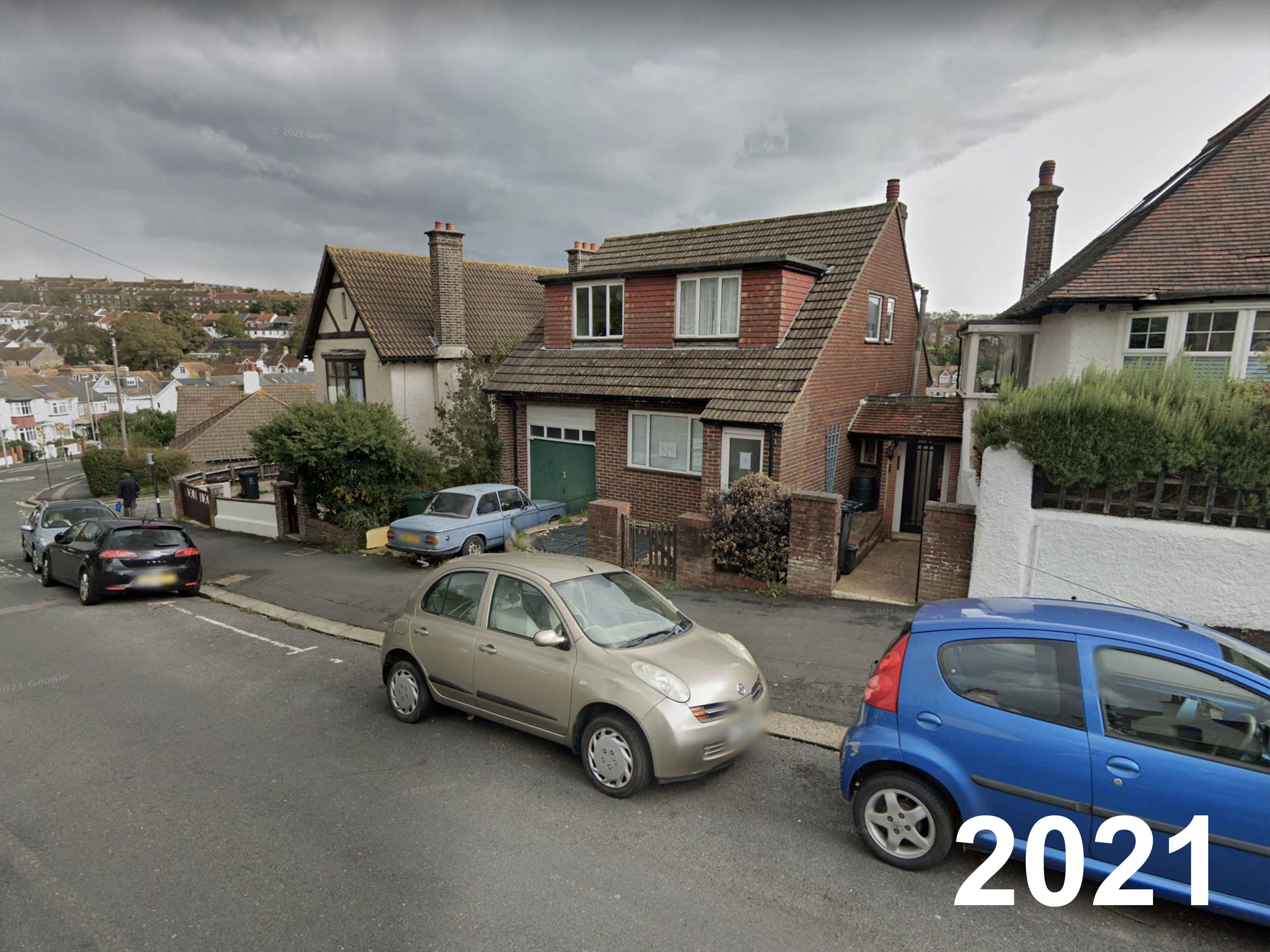 Photograph of LC03 FYJ - a Gold Nissan Micra parked in Hollingdean by a non-resident, and potentially abandoned. The thirteenth of seventeen photographs supplied by the residents of Hollingdean.