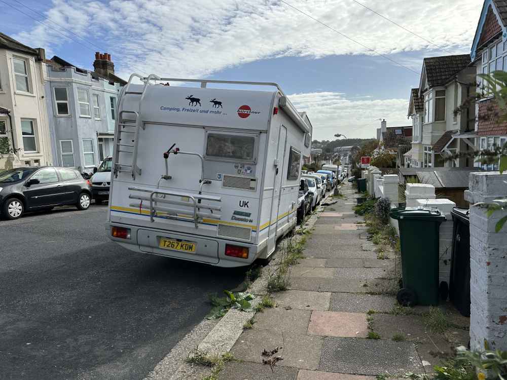 Photograph of T267 KDM - a White Fiat Ducato camper van parked in Hollingdean by a non-resident, and potentially abandoned. 