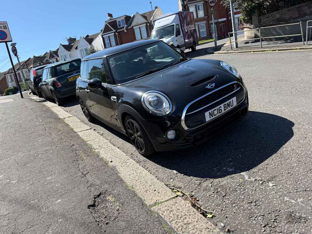 Photograph of NC16 BMU - a Black Mini Cooper parked in Hollingdean by a non-resident who uses the local area as part of their Brighton commute. The eighth of thirteen photographs supplied by the residents of Hollingdean.