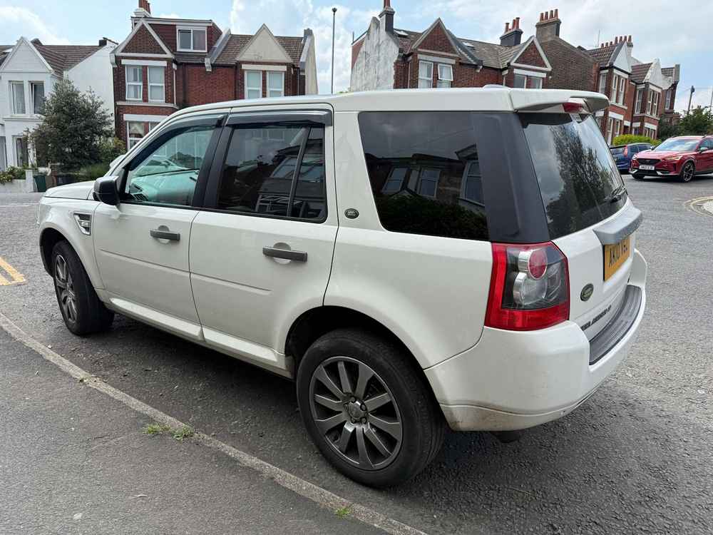 Photograph of AK10 VGZ - a White Land Rover Freelander parked in Hollingdean by a non-resident. The second of thirteen photographs supplied by the residents of Hollingdean.