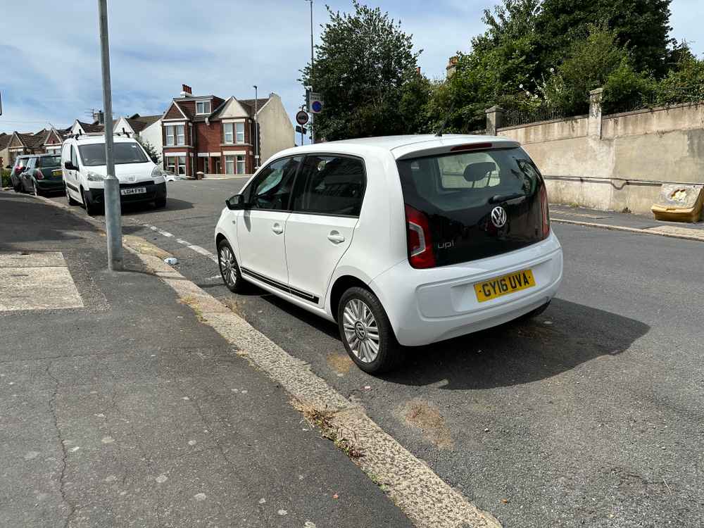 Photograph of GY16 UVA - a White Volkswagen Up parked in Hollingdean by a non-resident. The third of three photographs supplied by the residents of Hollingdean.