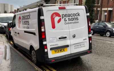 Y13 NCE, a white Vauxhall Vivaro parked in Hollingdean