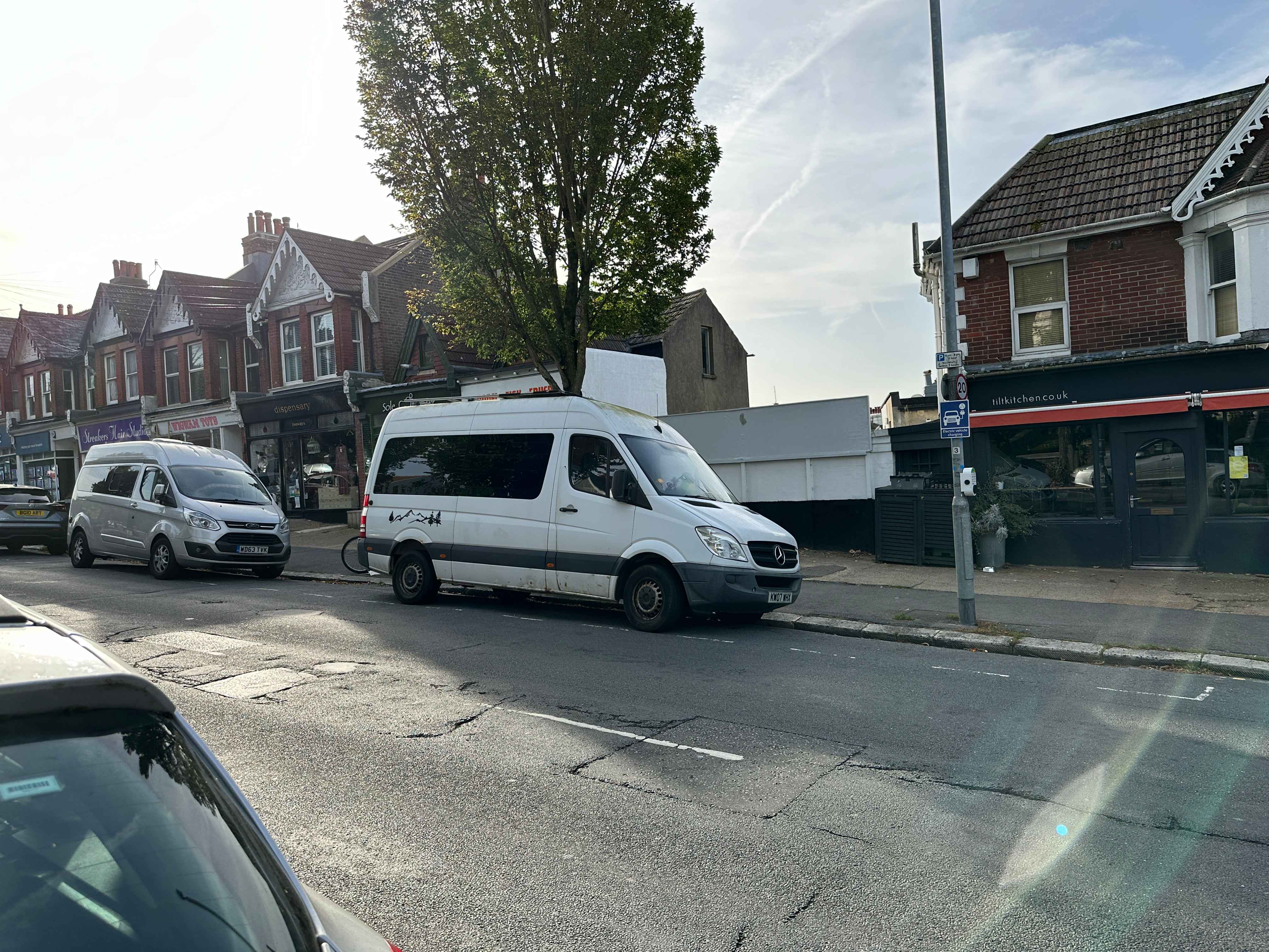 Photograph of KW07 WHX - a White Mercedes Sprinter camper van parked in Hollingdean by a non-resident. The first of four photographs supplied by the residents of Hollingdean.
