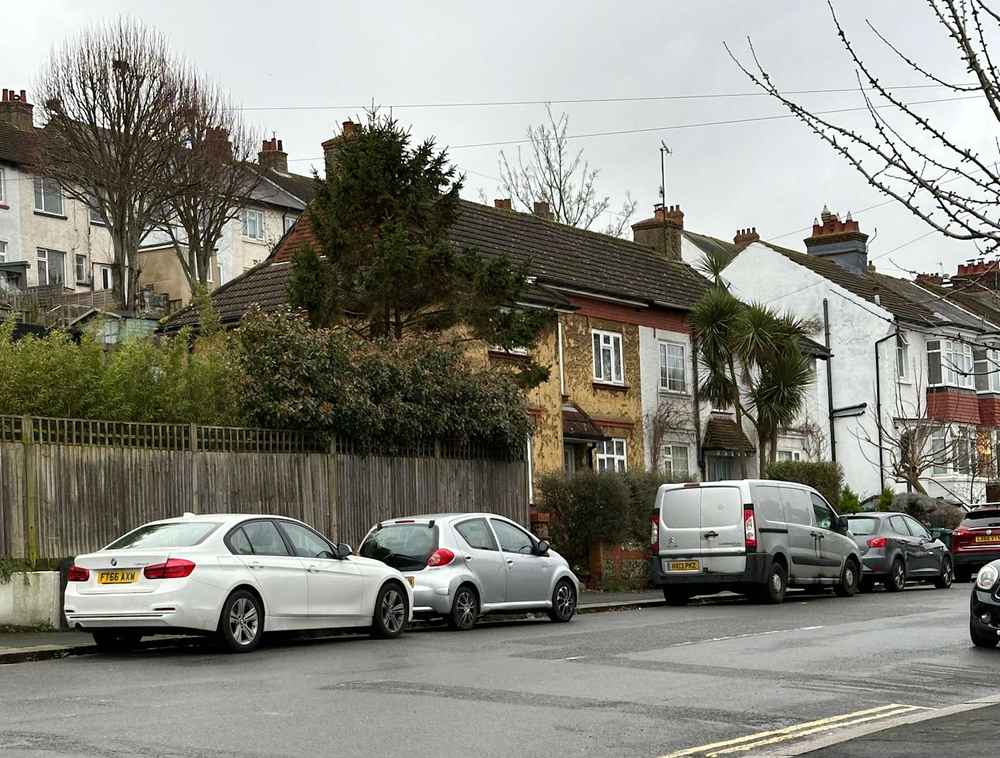 Photograph of FT66 AXW - a White BMW 3 Series parked in Hollingdean by a non-resident who uses the local area as part of their Brighton commute. The seventh of twenty-five photographs supplied by the residents of Hollingdean.