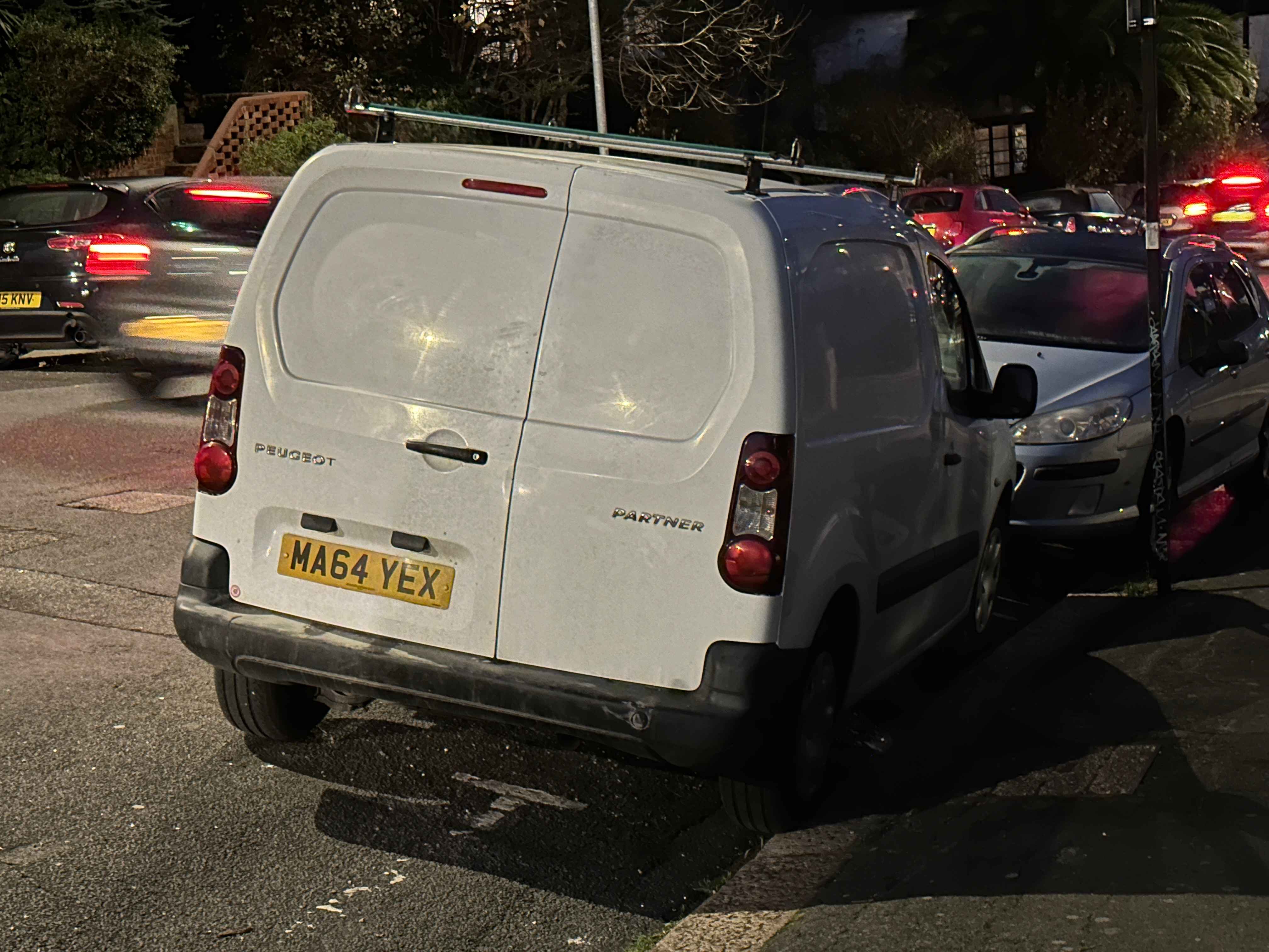 Photograph of MA64 YEX - a White Peugeot Partner parked in Hollingdean by a non-resident. The second of six photographs supplied by the residents of Hollingdean.