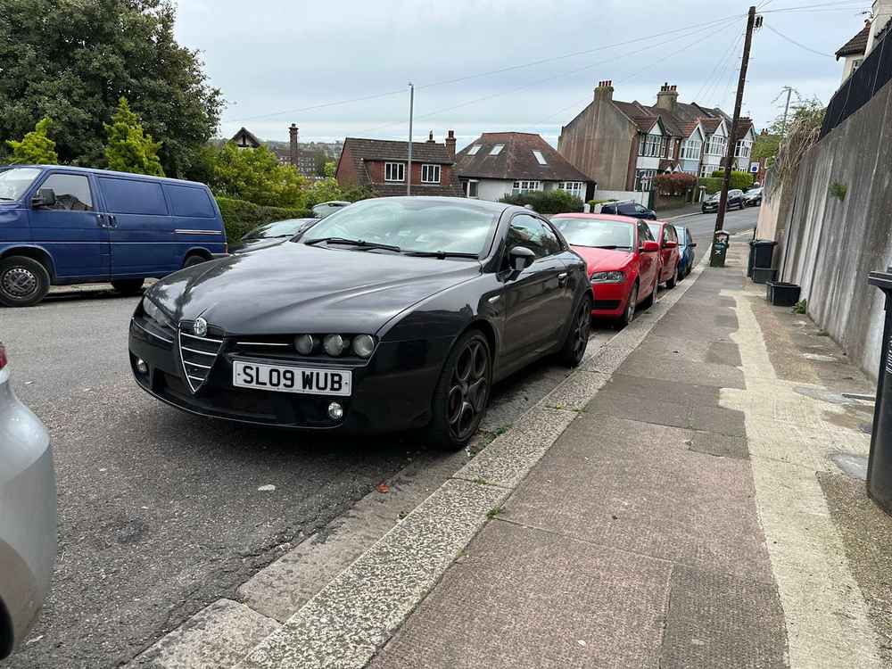 Photograph of SL09 WUB - a Black Alfa Romeo Brera parked in Hollingdean by a non-resident. The nineteenth of forty-four photographs supplied by the residents of Hollingdean.