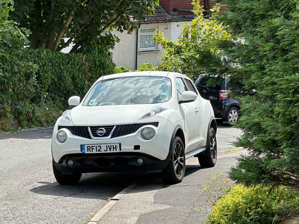 Photograph of RF12 JVH - a White Nissan Juke parked in Hollingdean by a non-resident who uses the local area as part of their Brighton commute. The ninth of nine photographs supplied by the residents of Hollingdean.