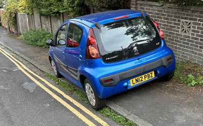 LN12 PBZ, a Blue Peugeot 107 parked in Hollingdean