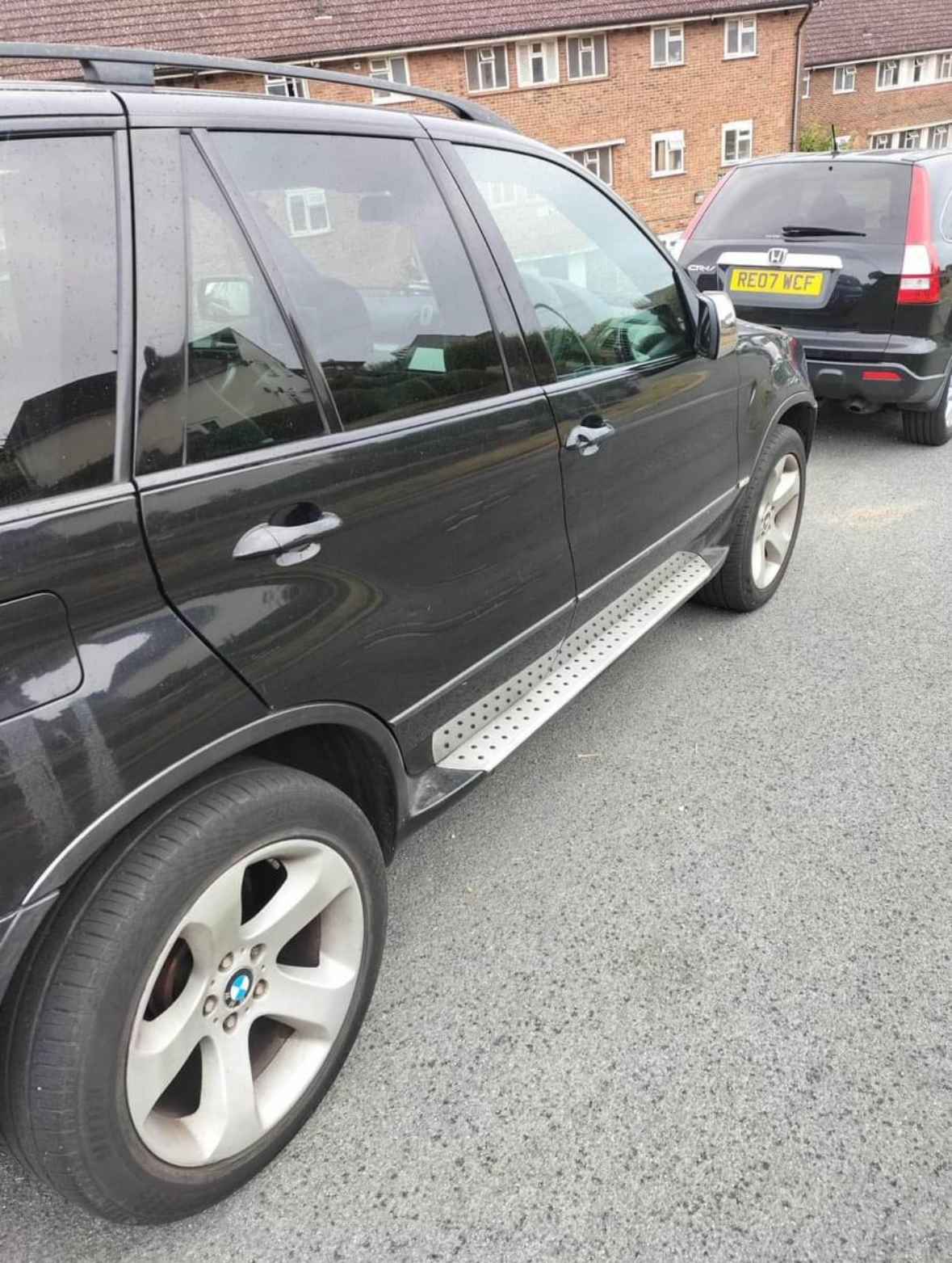 Photograph of VX05 XVA - a Black BMW X5 parked in Hollingdean by a non-resident and stored here whilst a dodgy car dealer attempts to sell it. The third of five photographs supplied by the residents of Hollingdean.