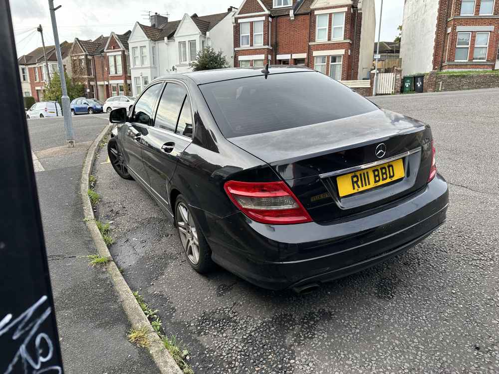 Photograph of R111 BBD - a Black Mercedes C Class parked in Hollingdean by a non-resident who uses the local area as part of their Brighton commute. 