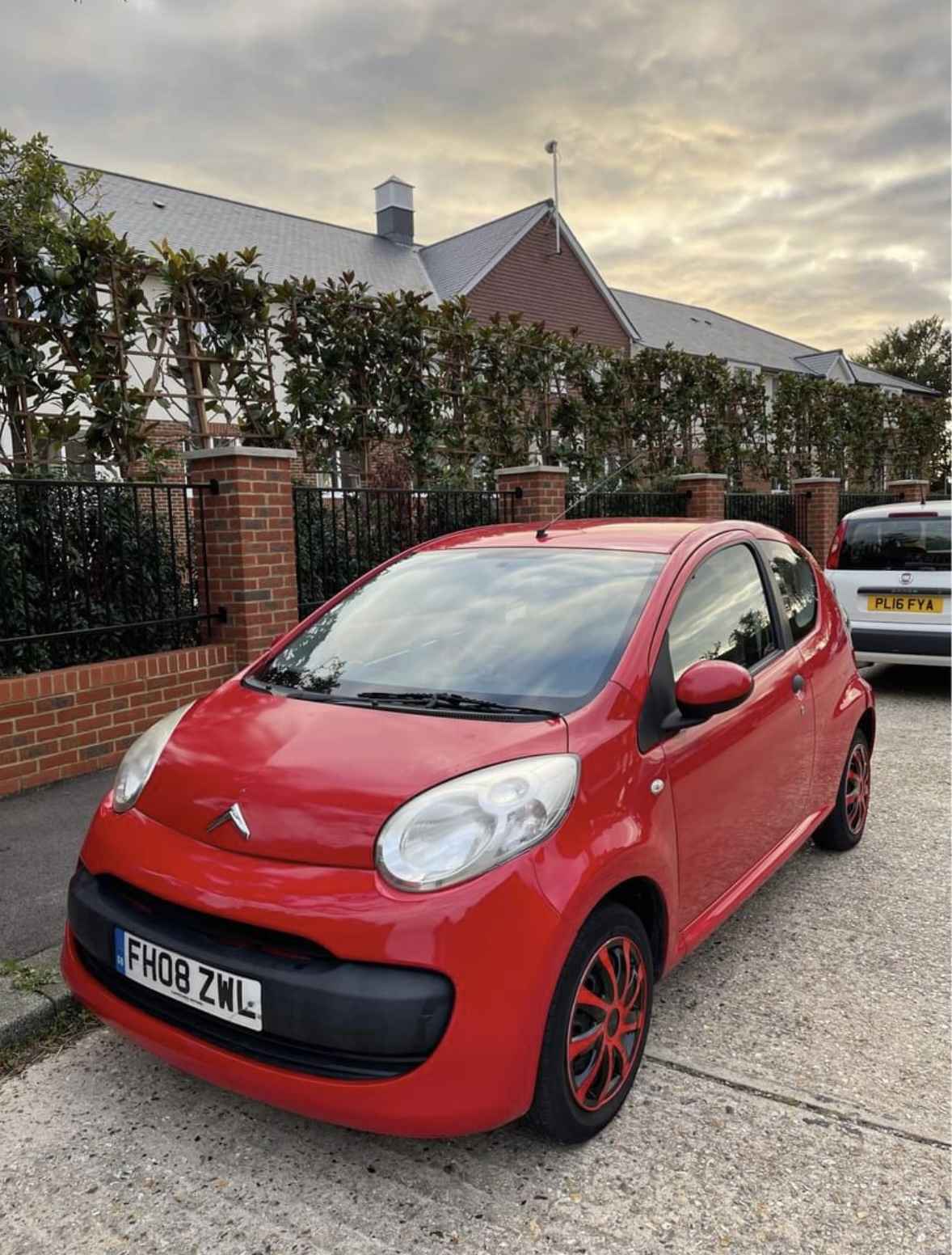 Photograph of FH08 ZWL - a Red Citroen C1 parked in Hollingdean by a non-resident and stored here whilst a dodgy car dealer attempts to sell it. The fifth of five photographs supplied by the residents of Hollingdean.