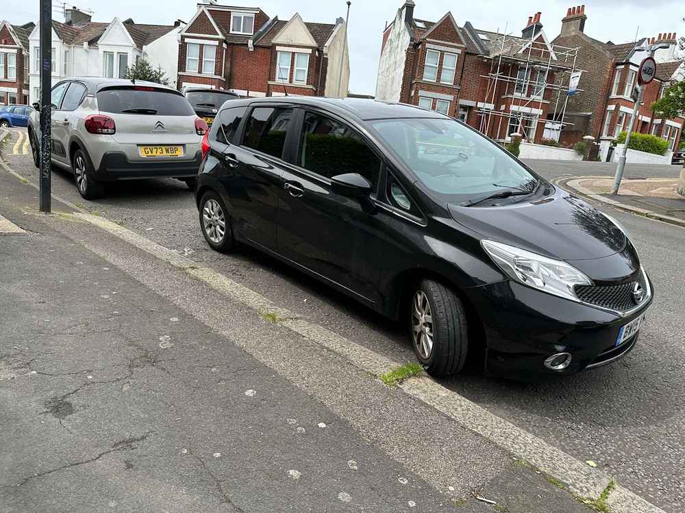 Photograph of BW15 VNJ - a Black Nissan Note parked in Hollingdean by a non-resident who uses the local area as part of their Brighton commute. The eighteenth of twenty-two photographs supplied by the residents of Hollingdean.