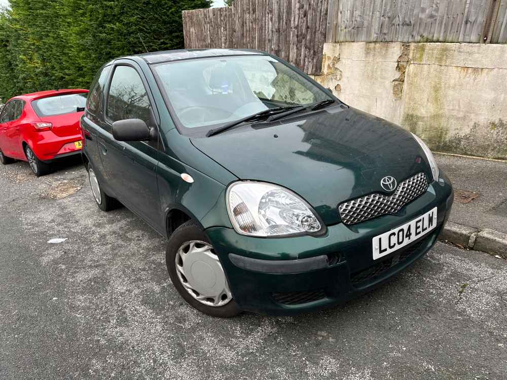 Photograph of LC04 ELW - a Green Toyota Yaris parked in Hollingdean by a non-resident. The tenth of twelve photographs supplied by the residents of Hollingdean.