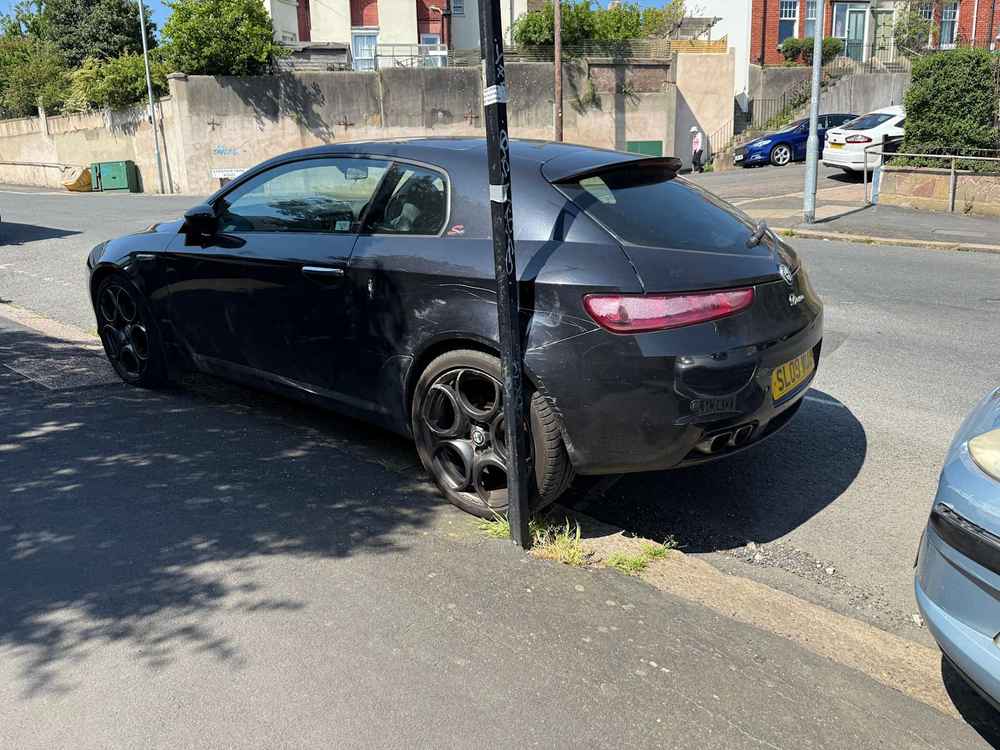 Photograph of SL09 WUB - a Black Alfa Romeo Brera parked in Hollingdean by a non-resident. The thirty-first of forty-four photographs supplied by the residents of Hollingdean.